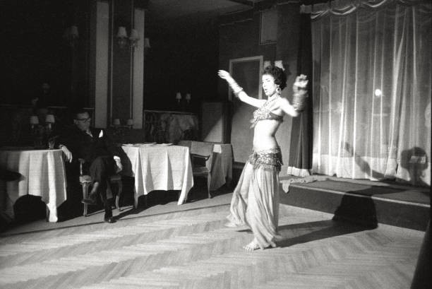 North African dancer Camelia performing belly dance a nightclub Mi- Old Photo