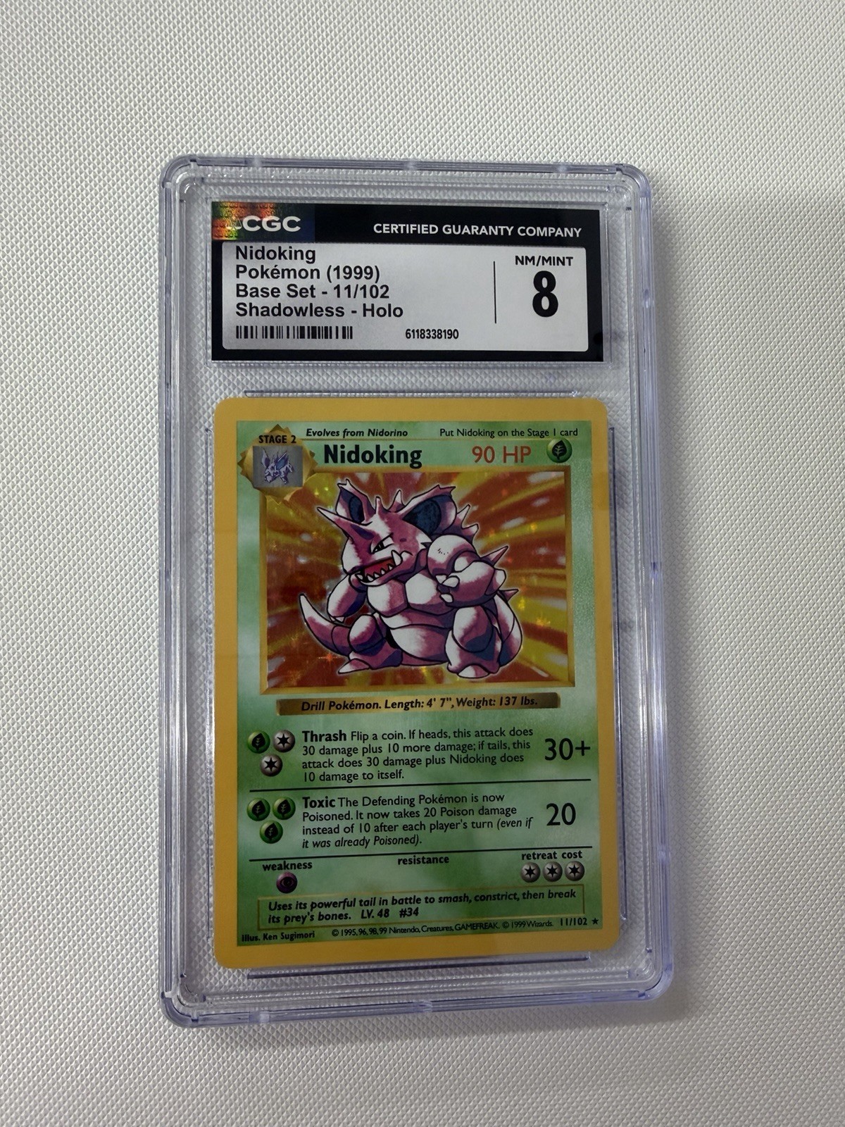 1999, Nidoking, #11, Base, Shadowless, Holo, CGC 8