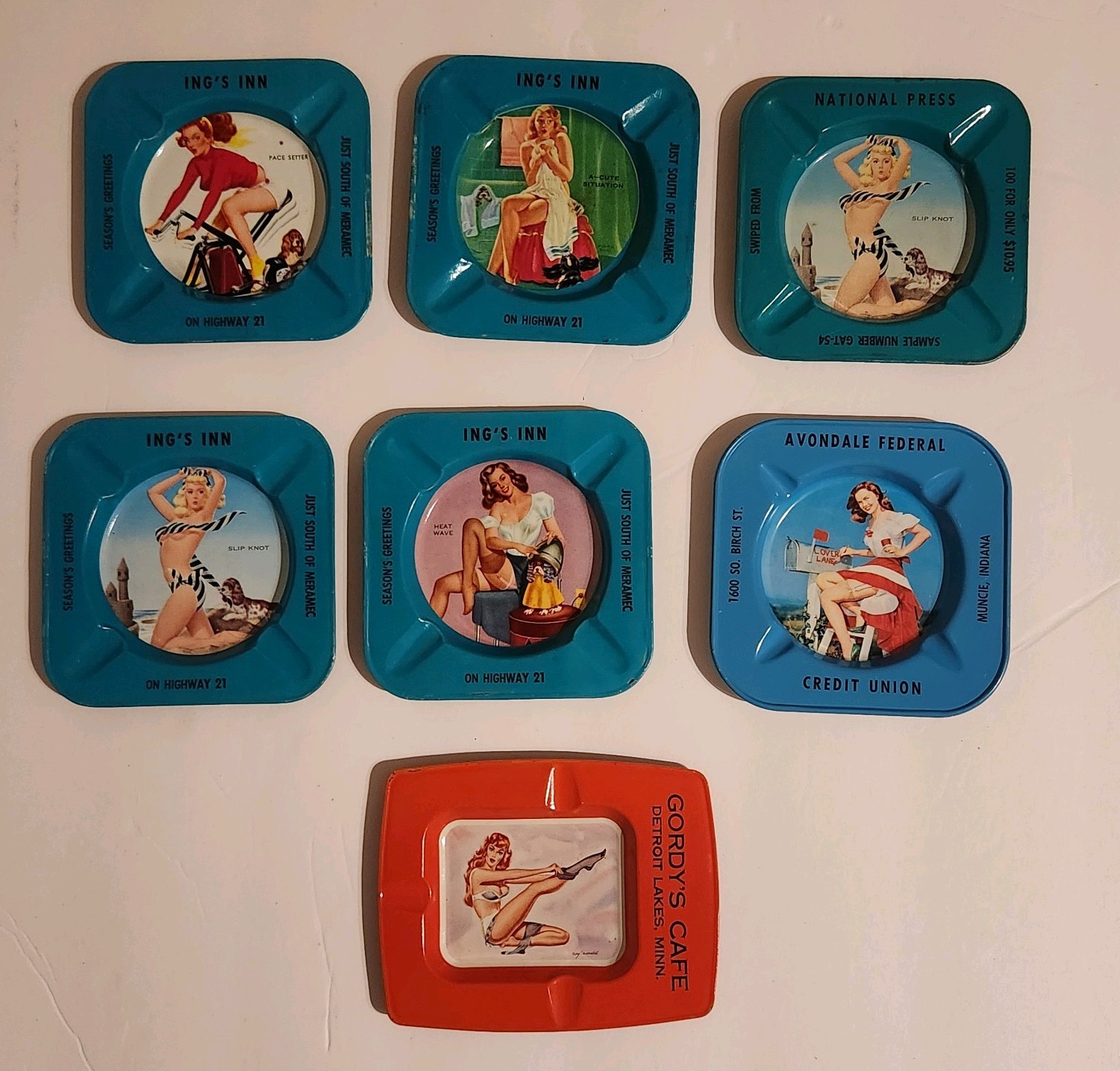 Vintage Pinup Glamour Girl Tin Advertising Ashtray Lot of 7