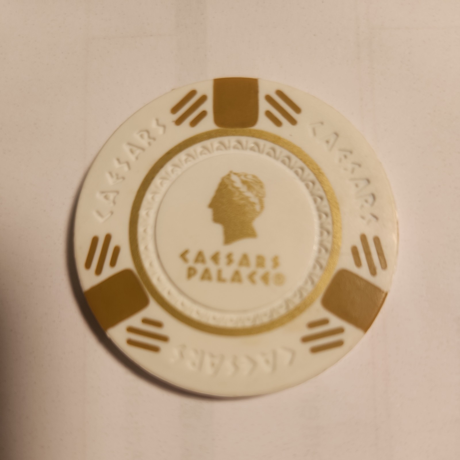 Caesars Palace Casino White and Gold Poker Chip