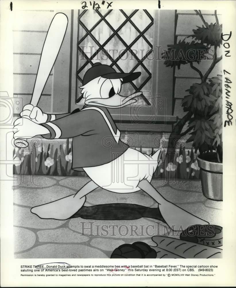 1948 Press Photo Donald Duck swats bee in 