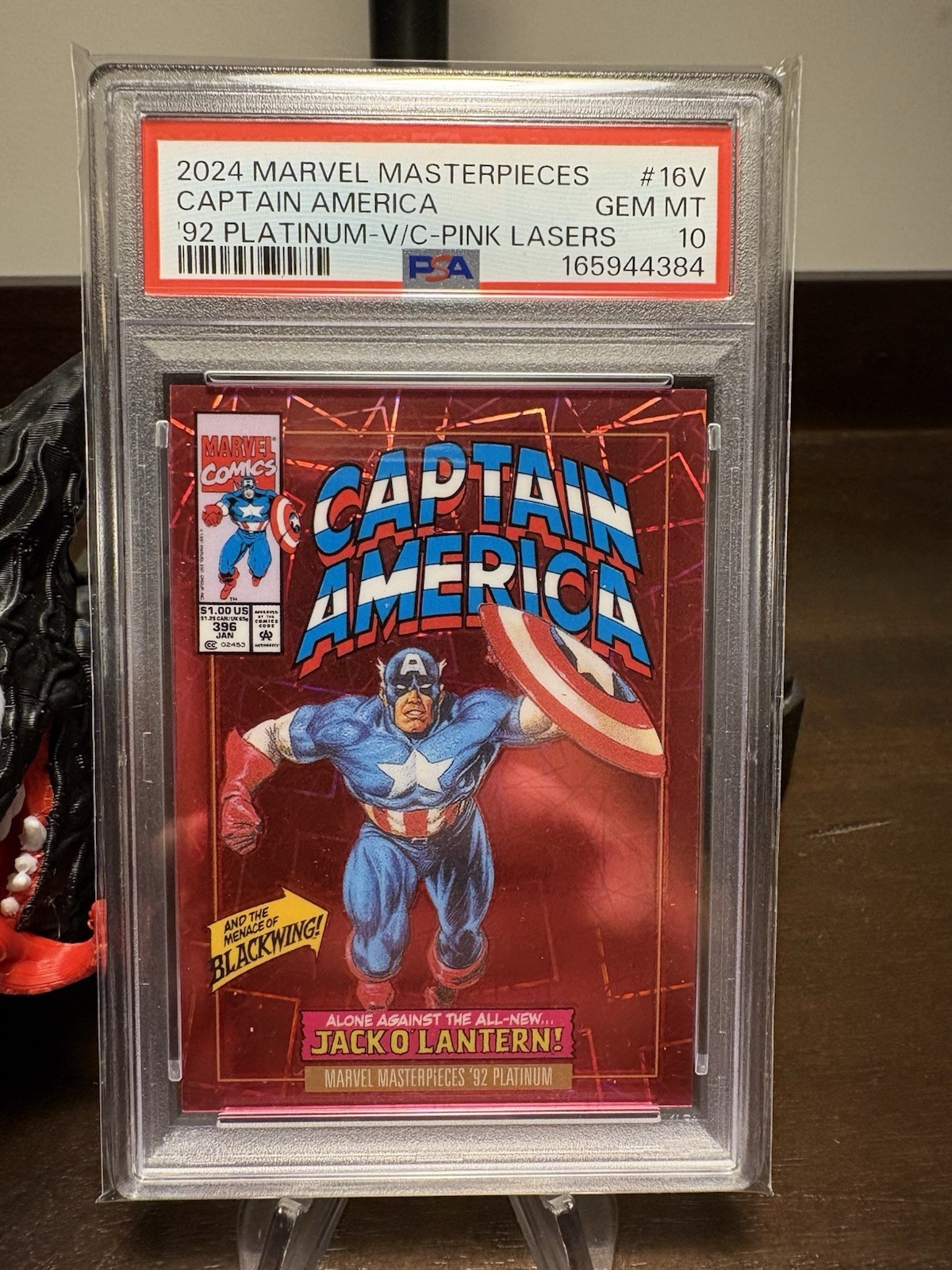2024 UD MARVEL MASTERPIECES '92 PLATINUM #16V CAPTAIN AMERICA PINK LASERS PSA 10 2024 UD MARVEL MASTERPIECES '92 PLATINUM #16V CAPTAIN AMERICA PINK LASERS PSA 10