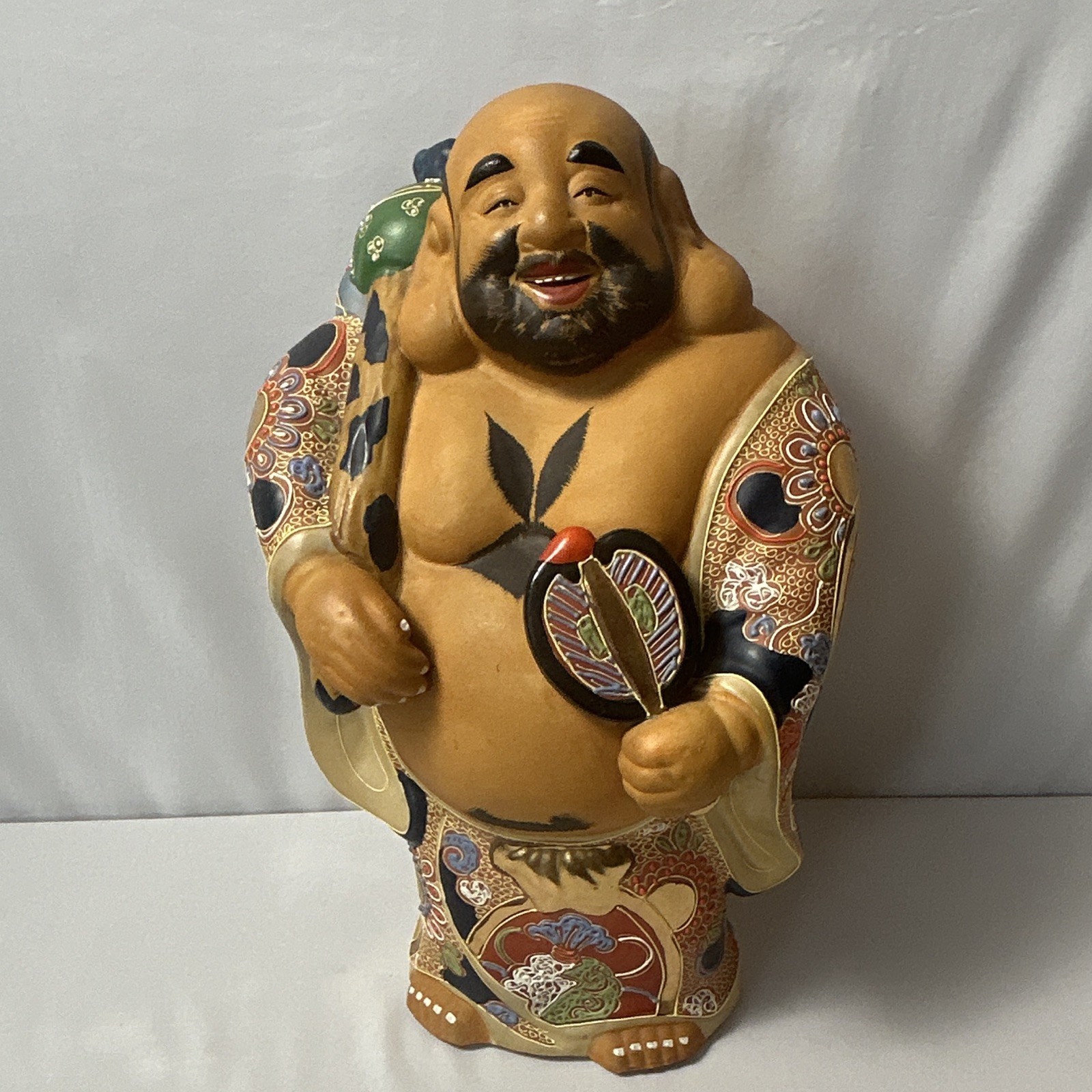 Vintage Japanese porcelain figurine of Hotei the laughing Buddha. 15