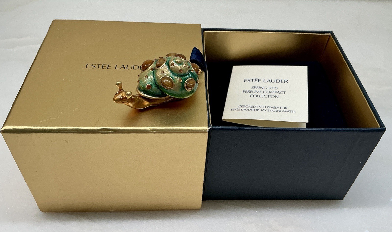 2010 ESTEE LAUDER  SOLID PERFUME COMPACT SHIMMERING SNAIL JAY STRONGWATER  NEW