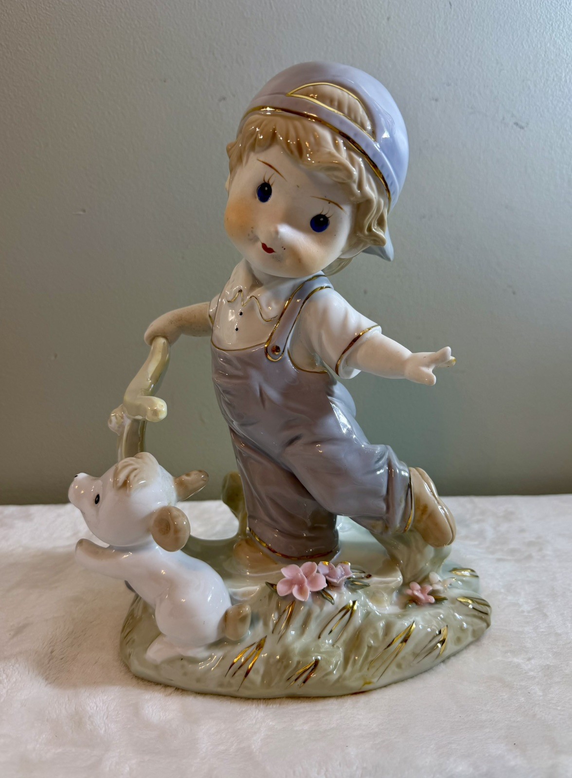 VTG Porcelain Boy Figurine w/ White Dog & Scooter. 10.5” T x 8.5” W. Gold Trim. 