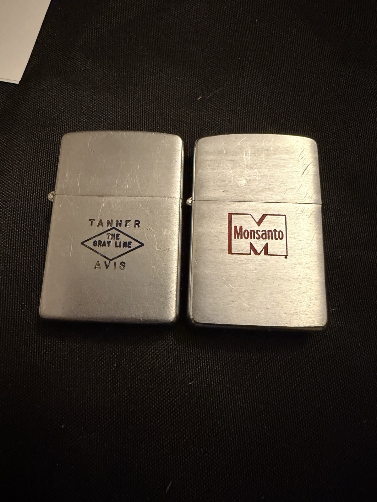 Two Vintage Zippo advertising Lighters