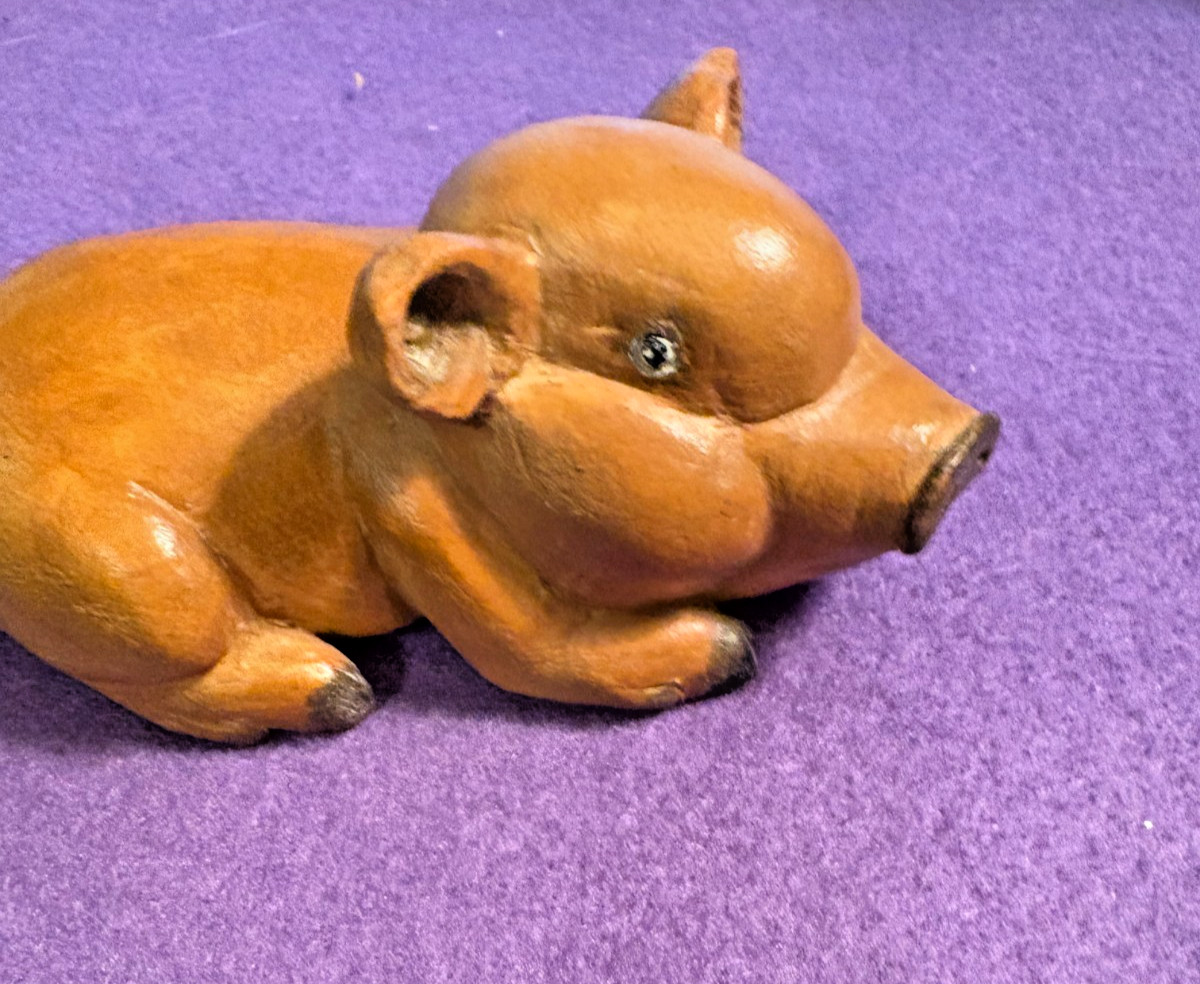 Vintage hand-carved wooden pig figurine