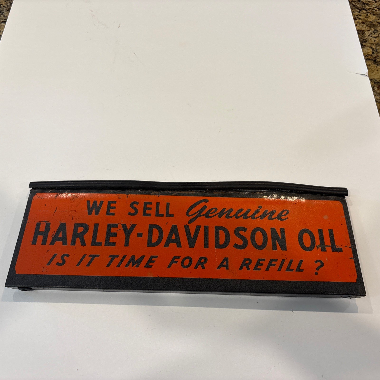 Front Of Vintage Harley Davidson Oil Countertop Parts Manual