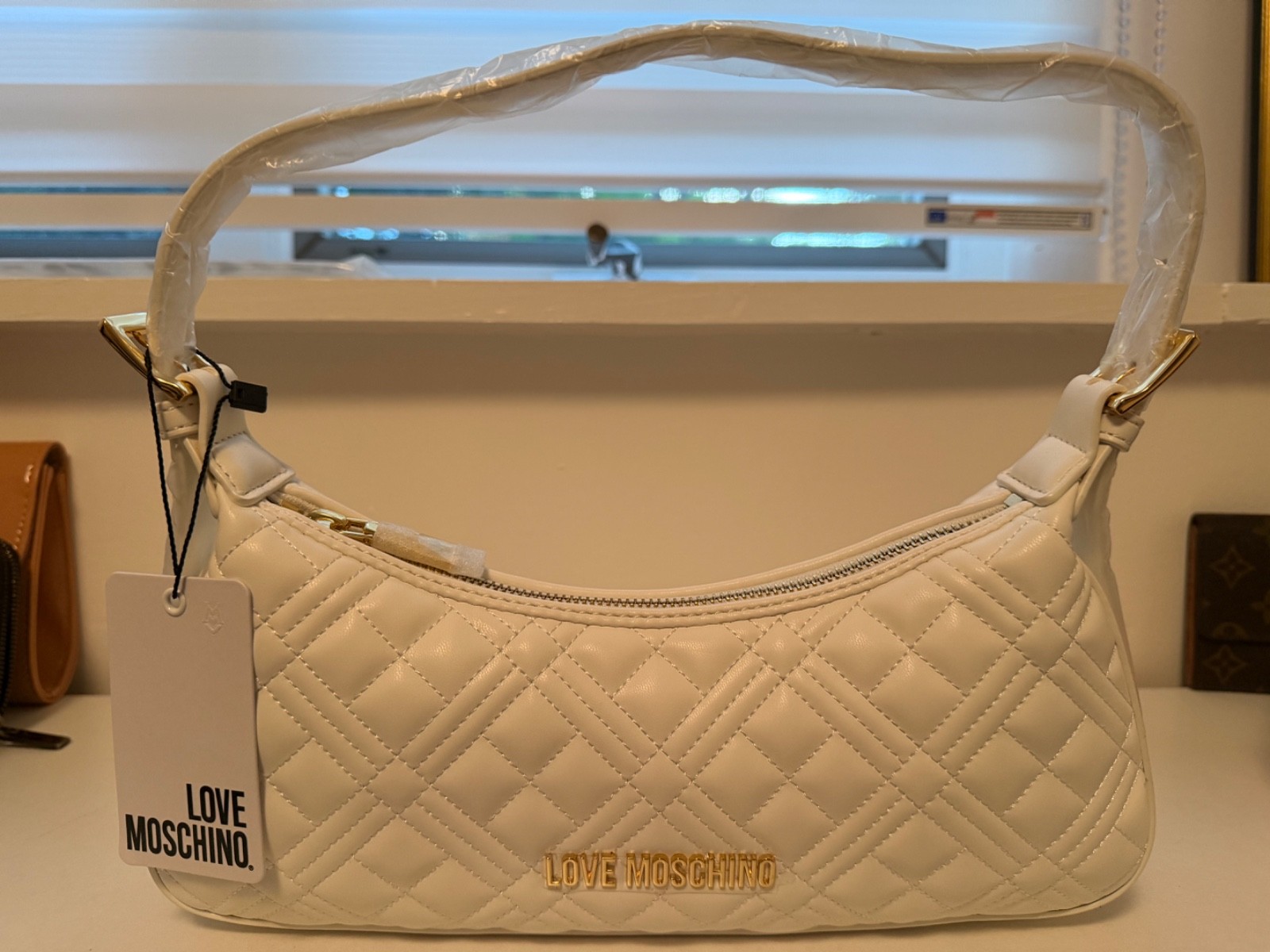 Authentic Love Moschino quilted shoulder bag