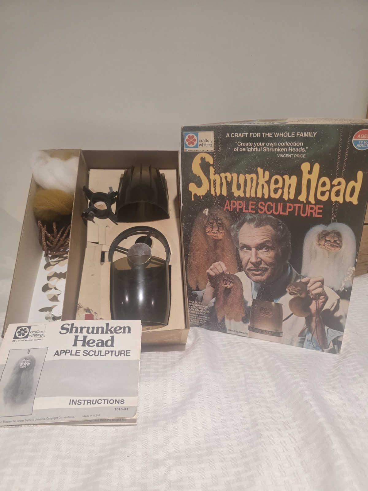 Vintage 1975 Vincent Price Shrunken Head Apple Sculpture Kit by Milton Bradley.
