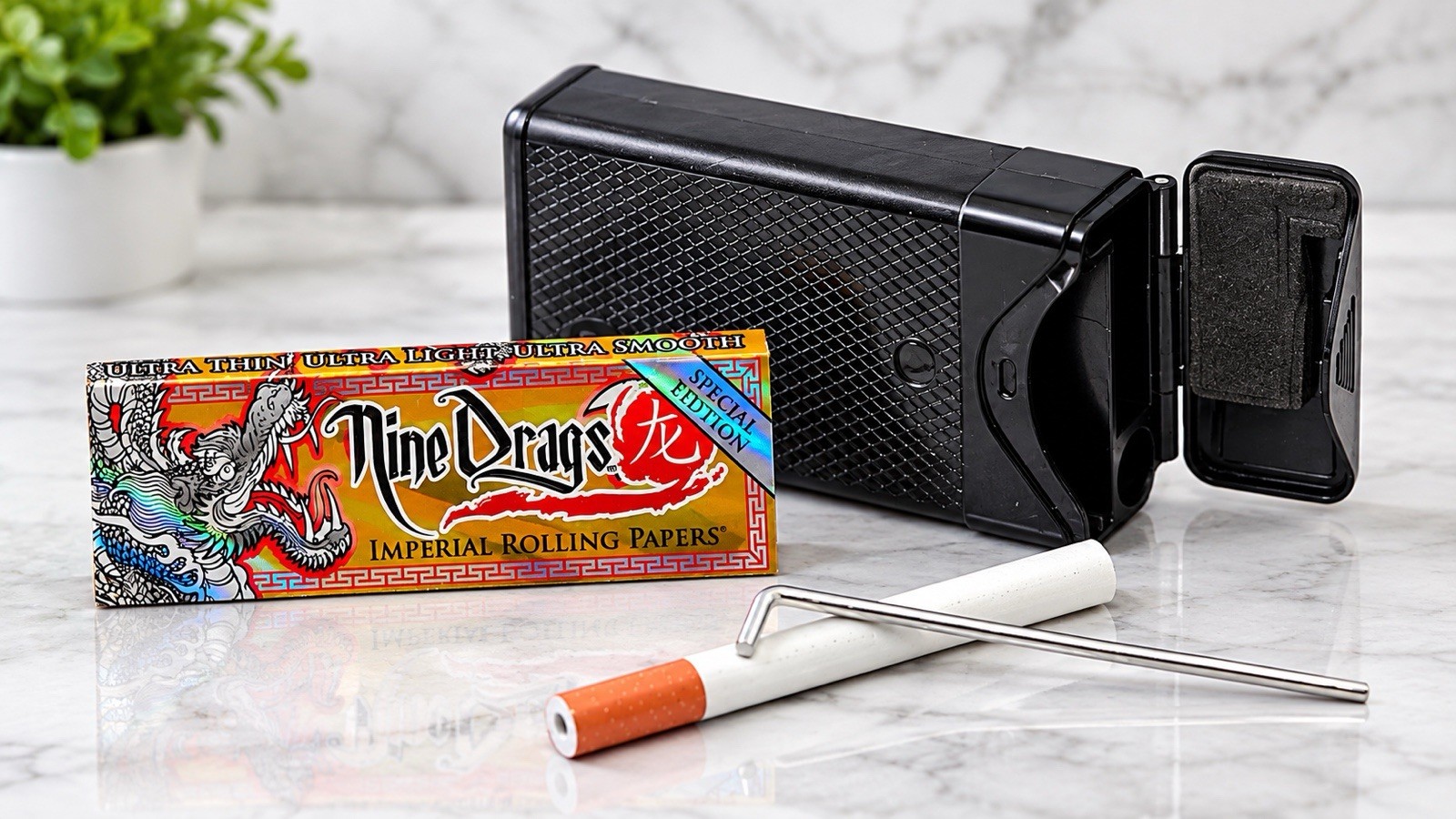 Patented Smokers Survival Kit. Comes w/Papers, One-Hitter & Poker. 