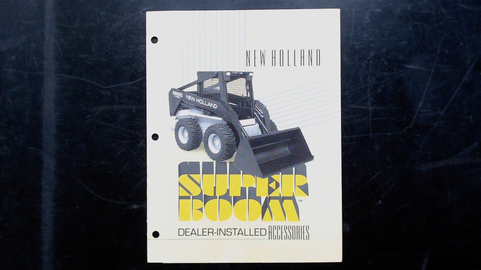 New Holland Super Boom Brochure 1885 Skid-Steer Dealer Accessories 1986