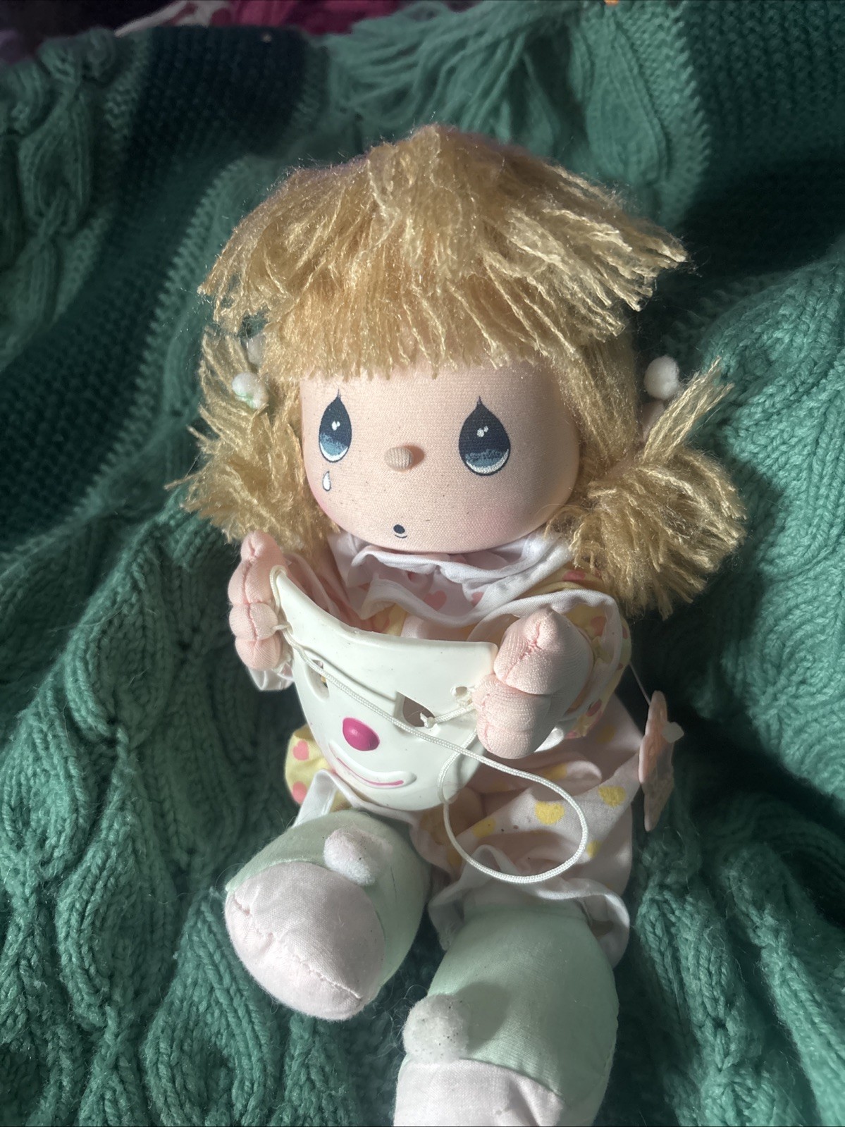 The twelfth item is a vintage 1989 Precious Moments \