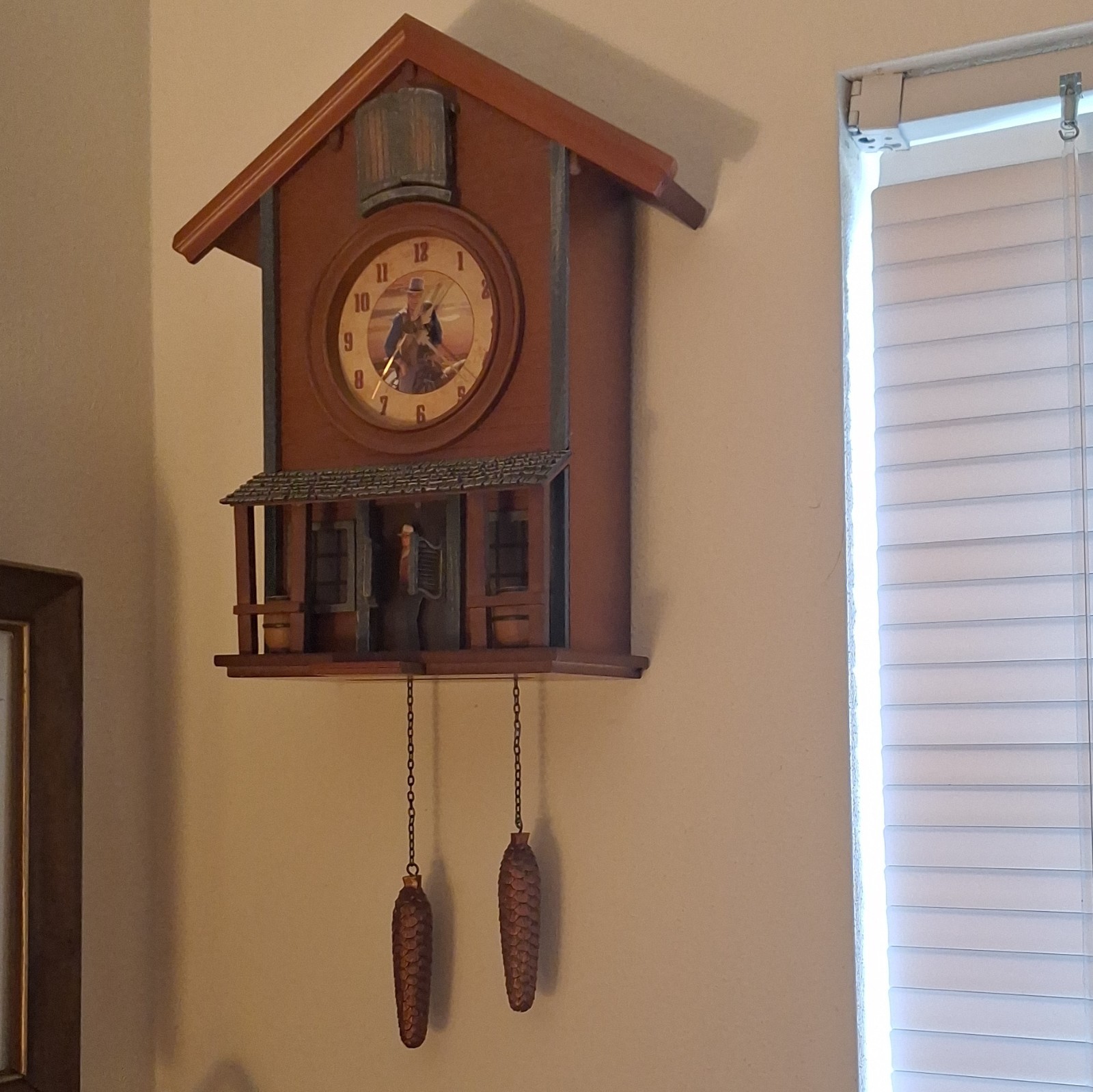 ** WOW**BEAUTIFUL JOHN WAYNE COCKOO CLOCK (works great)...Very Nice**