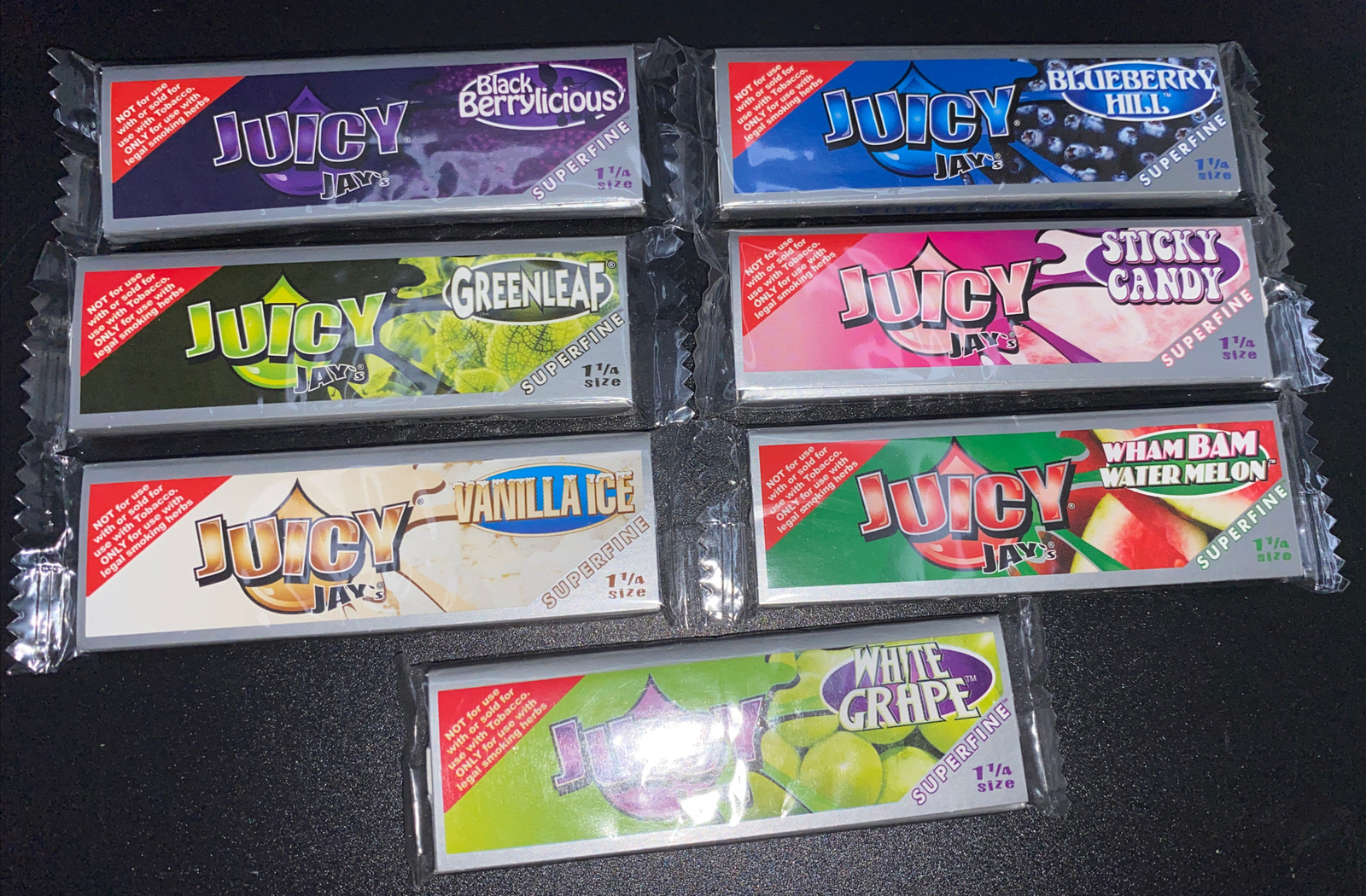 Juicy Jay’s 1 1/4 Rolling Papers Variety  Sampler 7 Pack (The Super Fine)