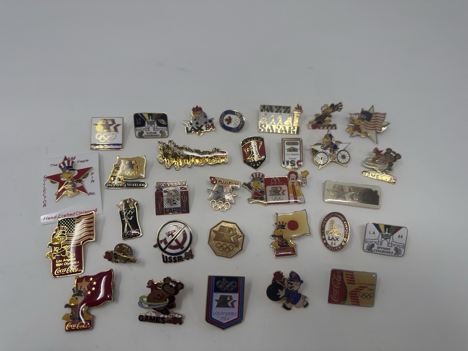 1984 LOS ANGELES OLYMPIC PIN BADGE LOT of 31 SAM THE EAGLE MASCOT SPONSORS