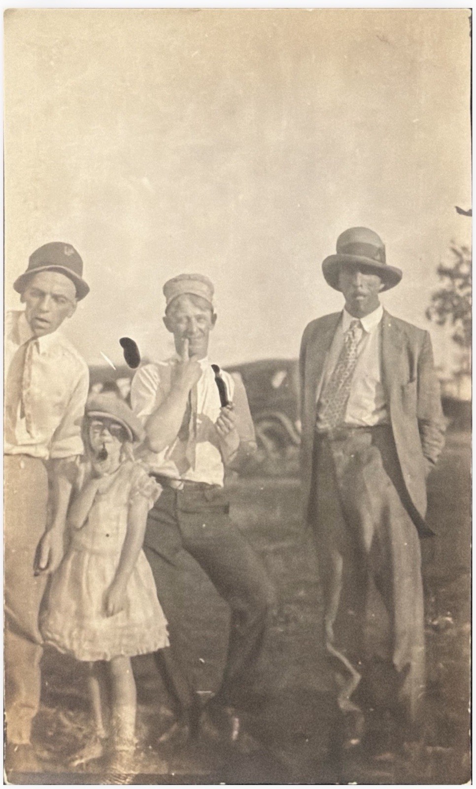 Postcard RPPC Interesting Group Zesty Male Over Sized Girl With Pipe Weird