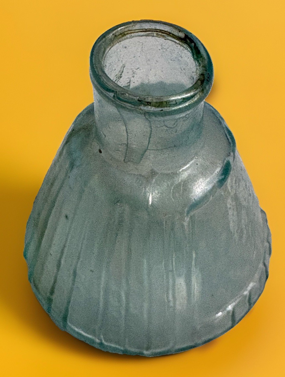 Antique ink bottle. A little shorter  than your usual umbrella, really a sweetie