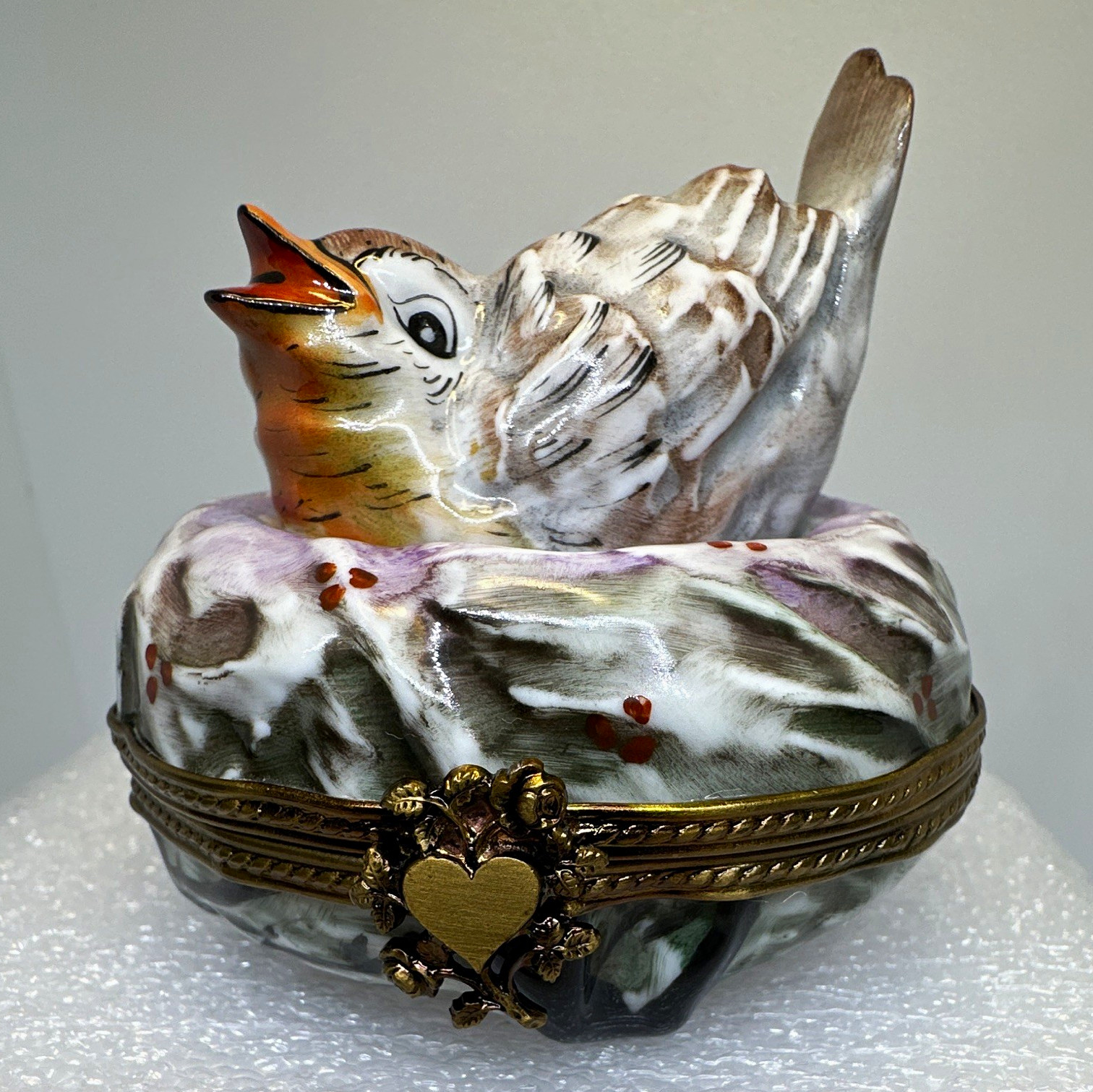 Limoges Trinket Box- Bird set deeply in Nest - Ornate shape & Clasp Signed PV 