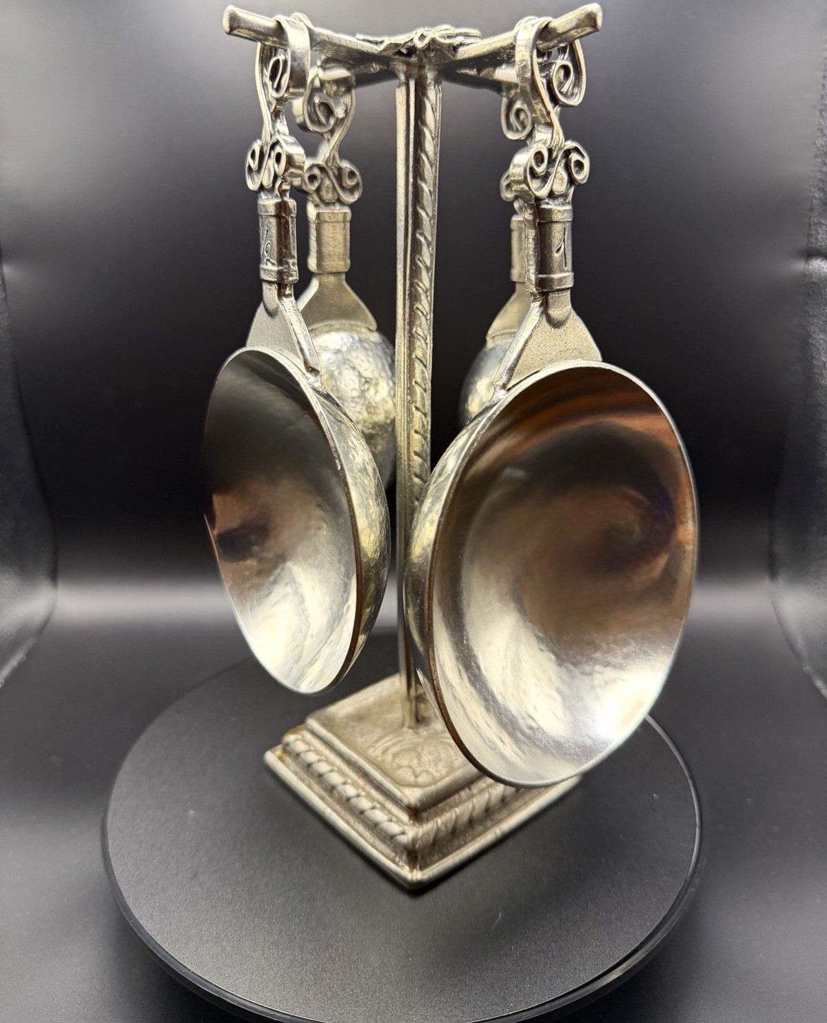 Crosby and Taylor Vineyard measuring cup set and stand in pewter.