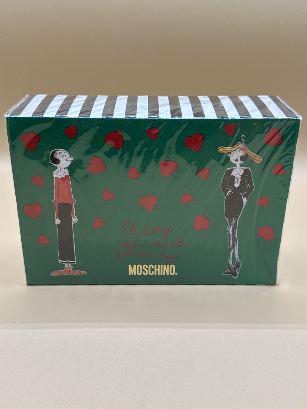 Cheap and Chic set by MOSCHINO. Set includes 4 mini items. New in Box