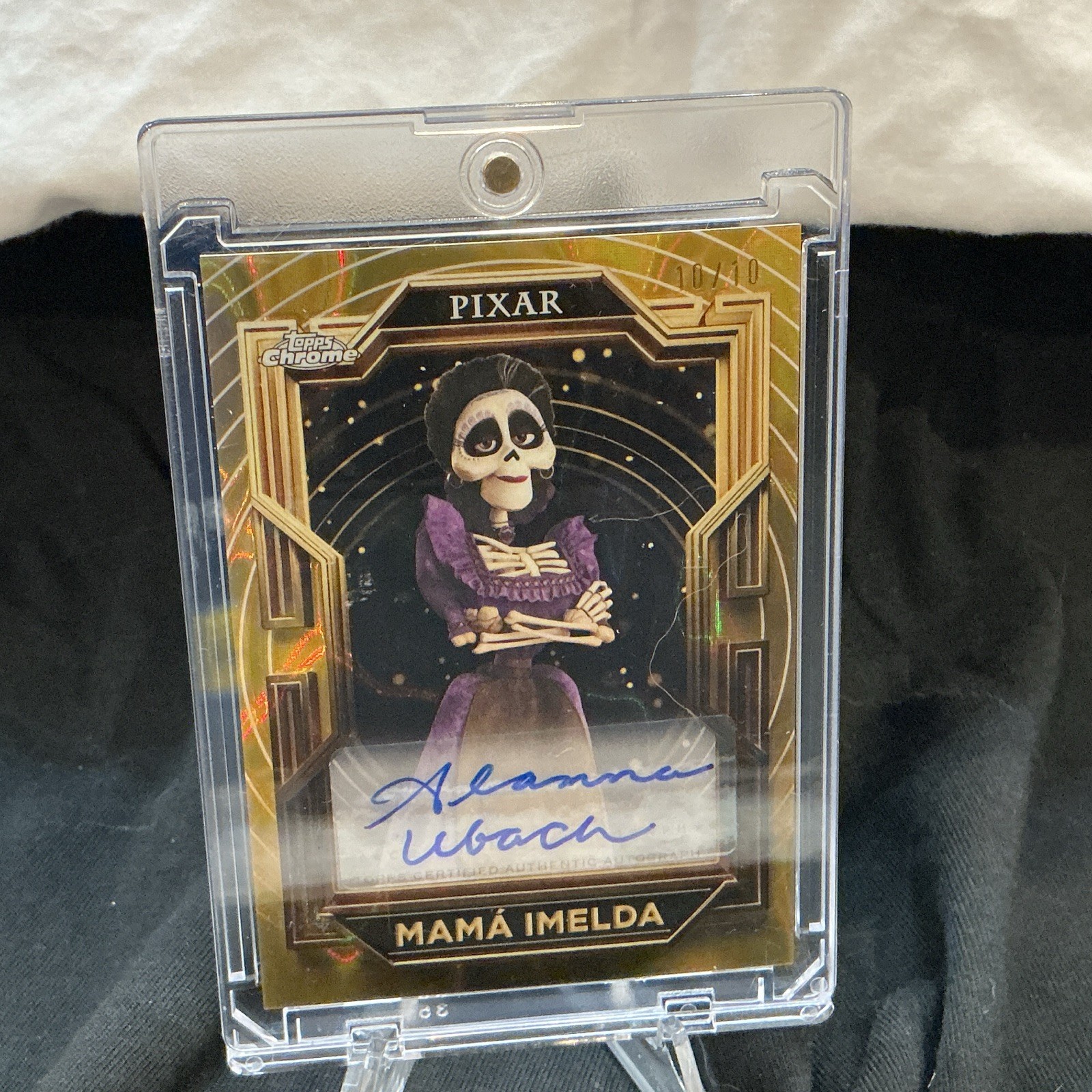 2025 Topps Chrome Pixar Gold Mama Imelda Auto /10 - Alanna Ulbach #10