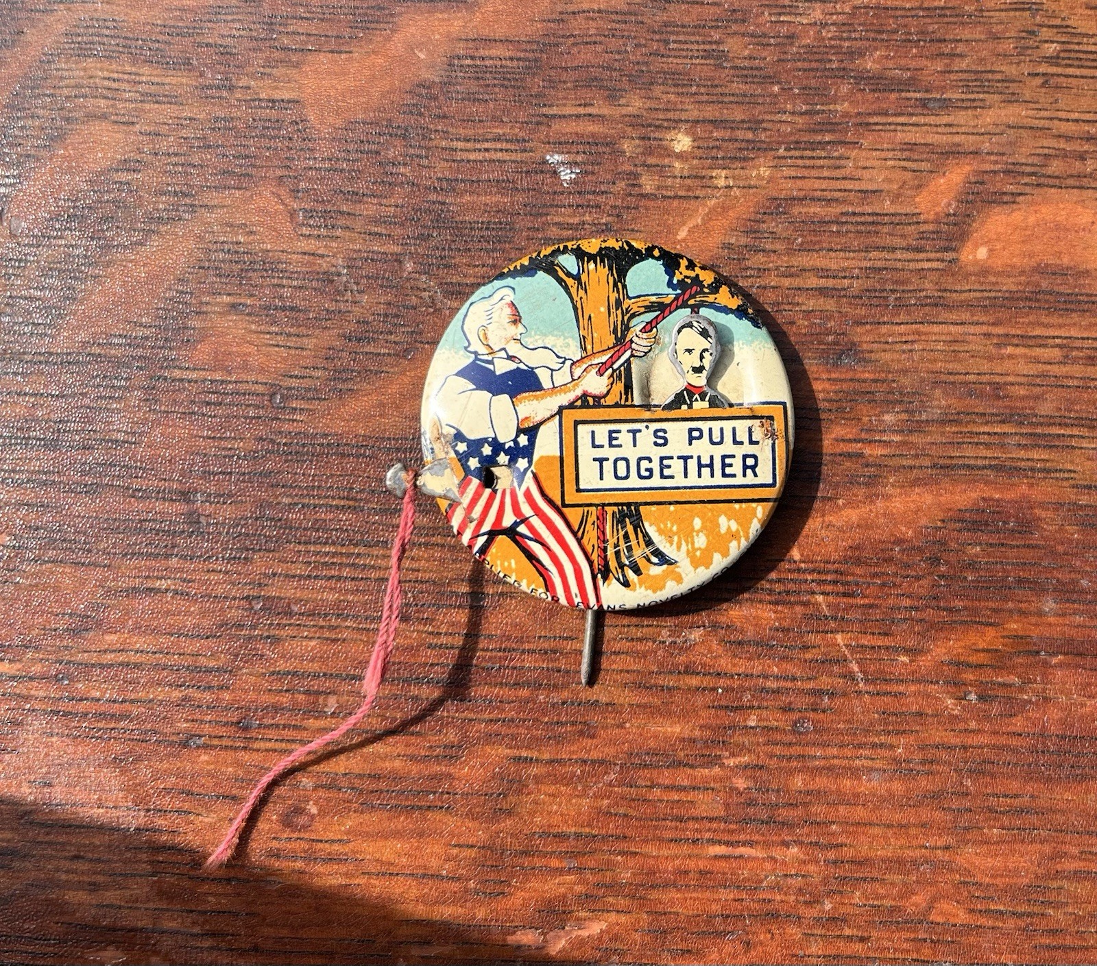 Vintage WWII Uncle Sam Hitler “Let’s Pull Together” Mechanical Pinback Pin