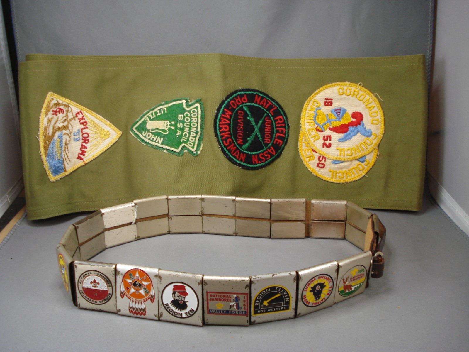 HUGE LOT OF 30\'S-60\'S BOY SCOUT METAL BELT LOOPS AND SASH WITH PATCHES