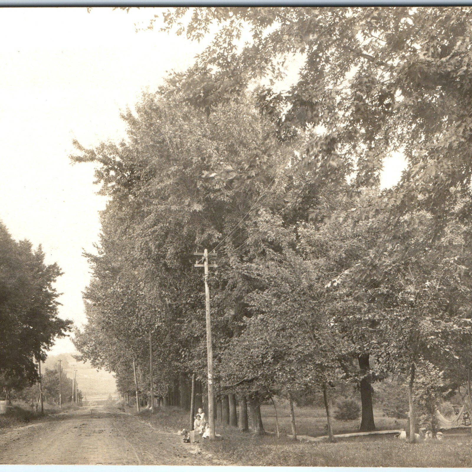 c1910s Cute Children Play Dirt Road RPPC Farm House Hammock Real Photo Postcard