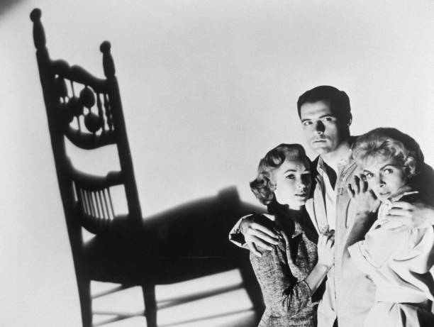Vera Miles John Gavin Janet Leigh cower beneath the shadow of a ro- Old Photo