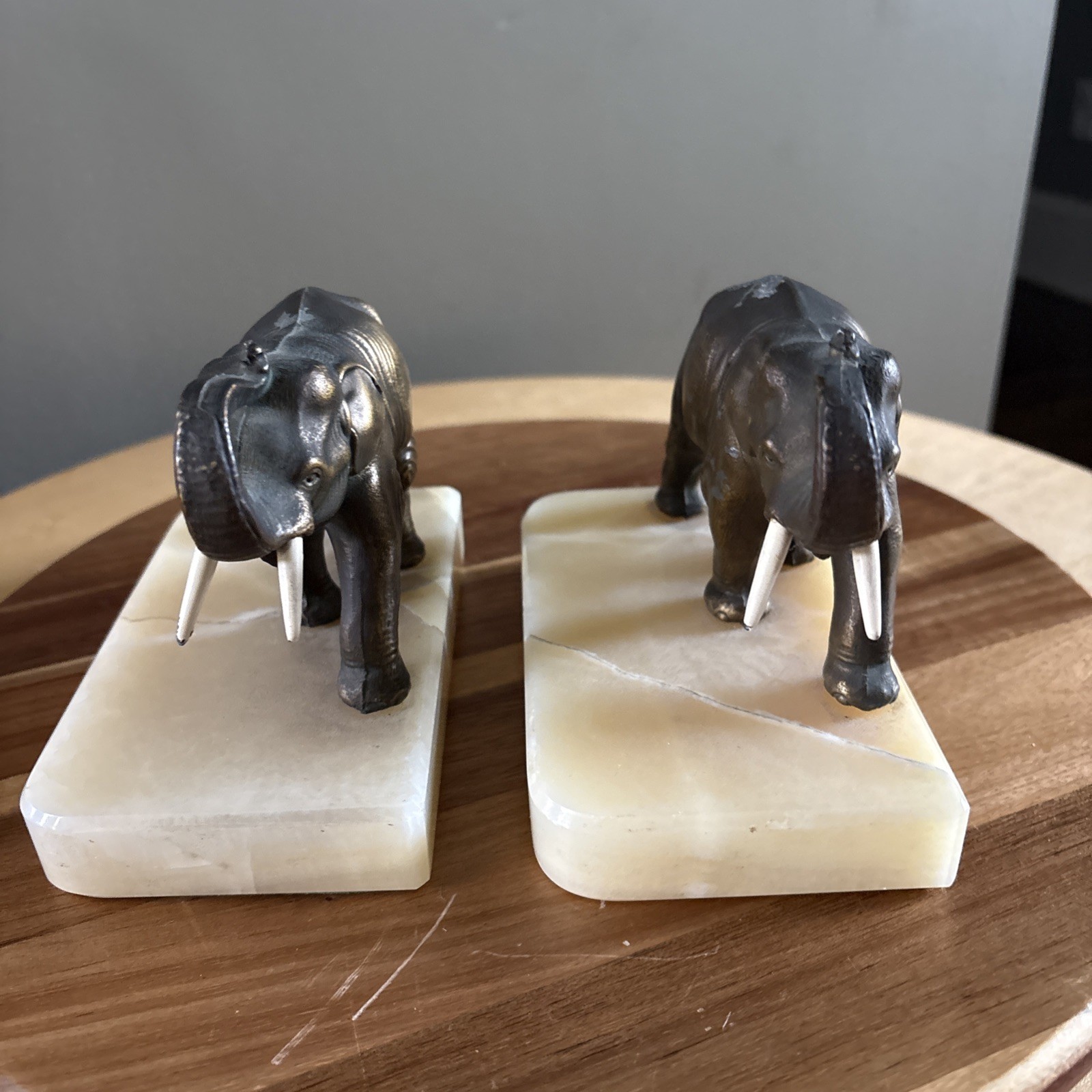 (2) vintage bronze painted metal Elephant bookends on marble bases.