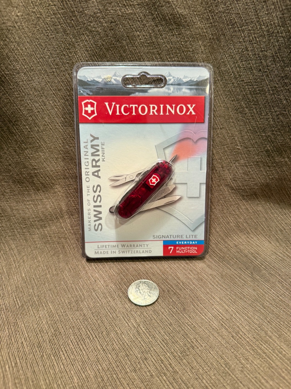 Victorinox Swiss Army Knife; SIGNATURE LITE model Translucent RED  58mm