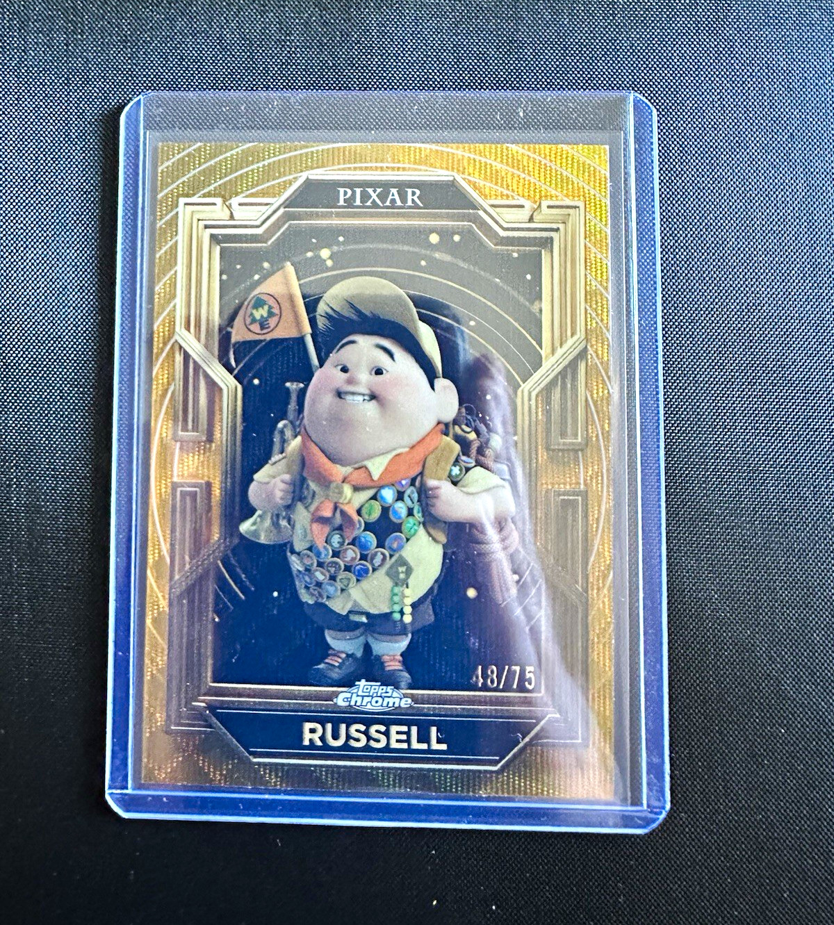 Topps 2025 Topps Chrome Disney/Pixar Russell Up #49 Serial Numbered 48/75