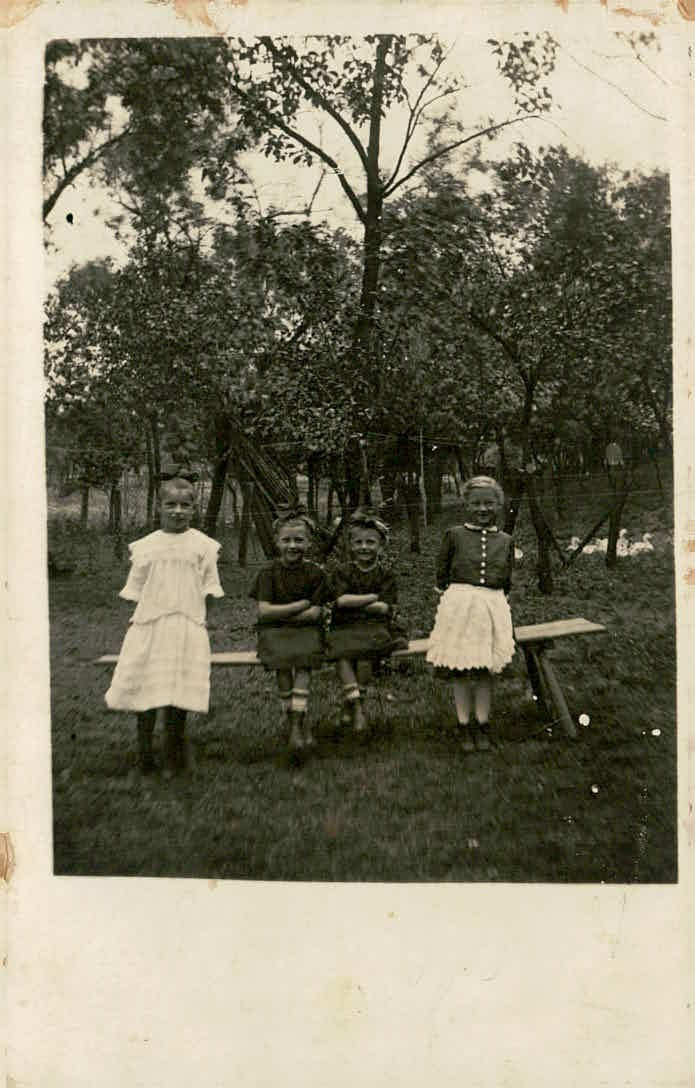 Vintage RPPC Four Young Girls Playing Outdoor Bench Seessaws Postcard