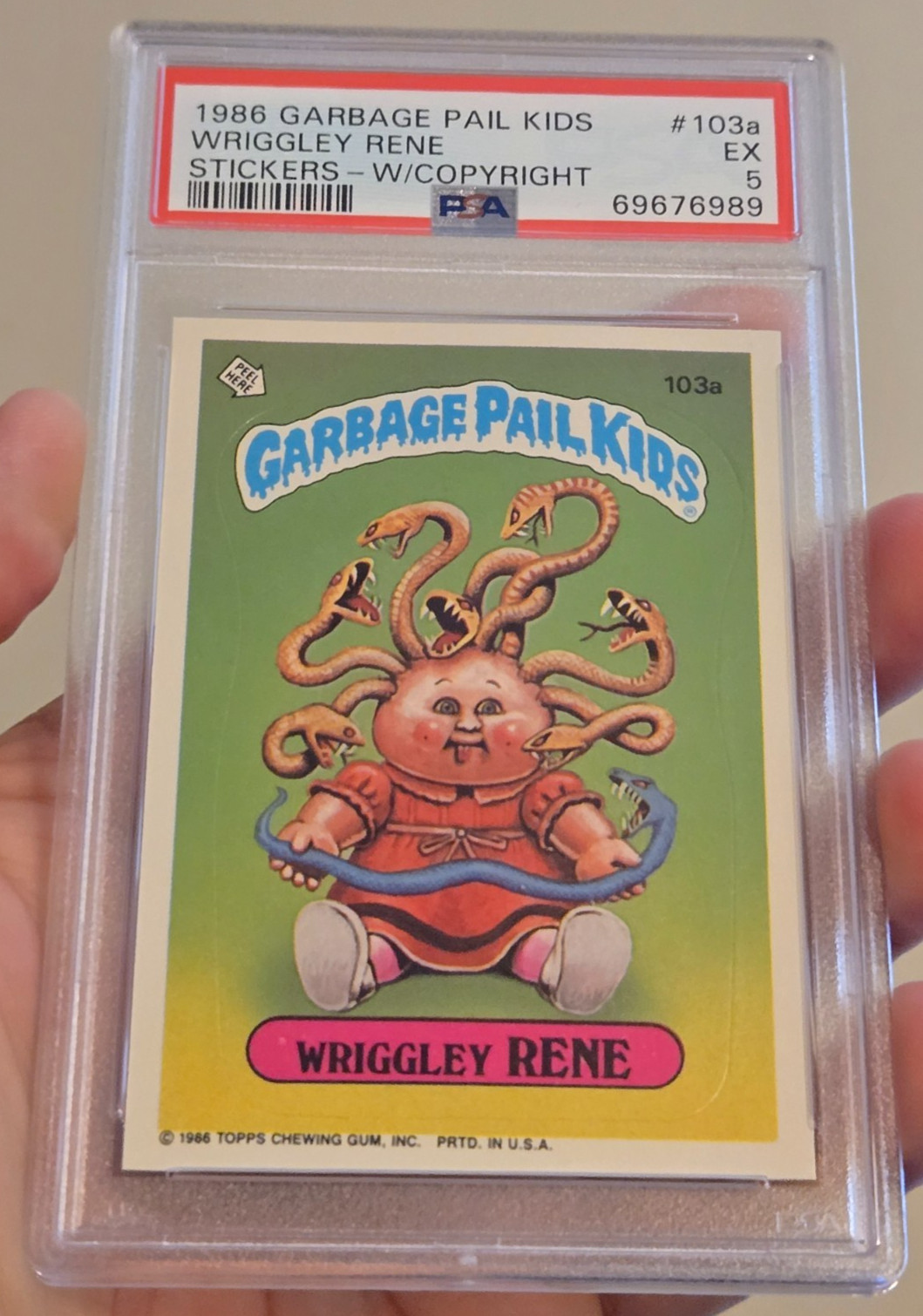 1986 TOPPS GARBAGE PAIL KIDS STICKERS WRIGGLEY RENE #103a COPYRIGHT GPK PSA 5 EX