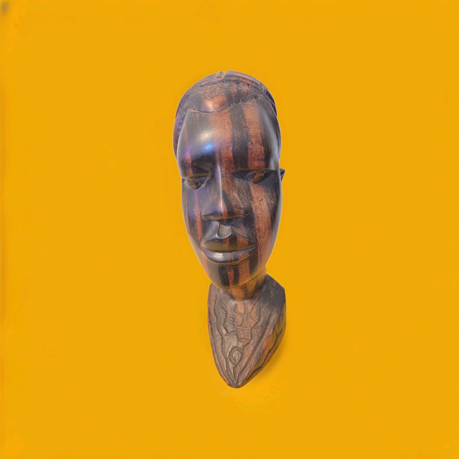Title: “Vintage Hand-Carved African Ebony Bust Sculpture—Unique Tribal Art 8.5in