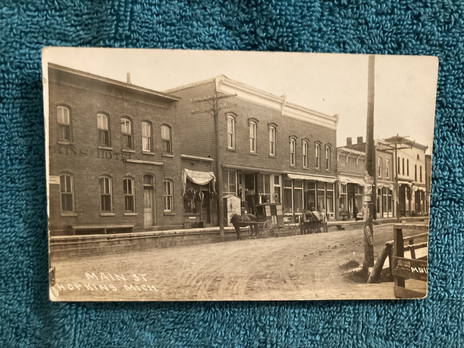 RPPC Hopkins Michigan Main Street Scene, RFD Mail Wagon Photo Unposted c1910