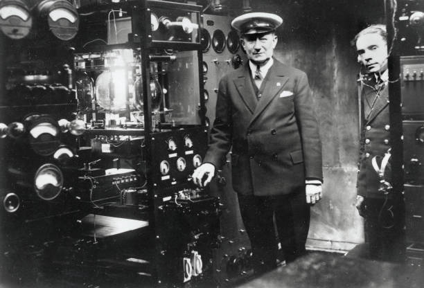 Guglielmo Marchese Marconi surrounded by electrical wireless equip- 1930s Photo