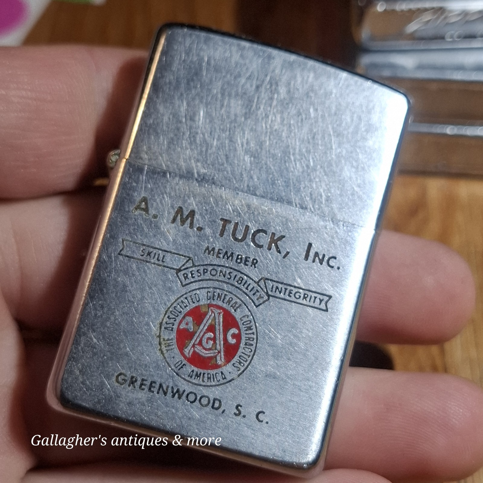 Vintage 1965 Zippo Lighter AM Tuck Inc Greenwood SC AGC Advertising Pat 2517191