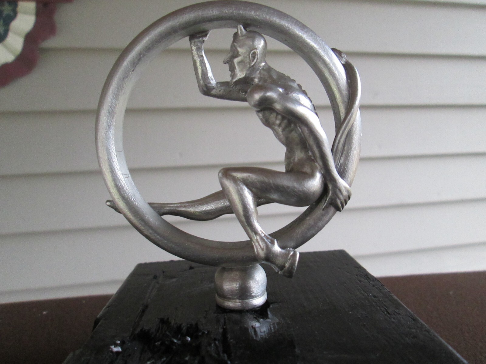speed demon on riding tire satan   hotrod car hood ornament