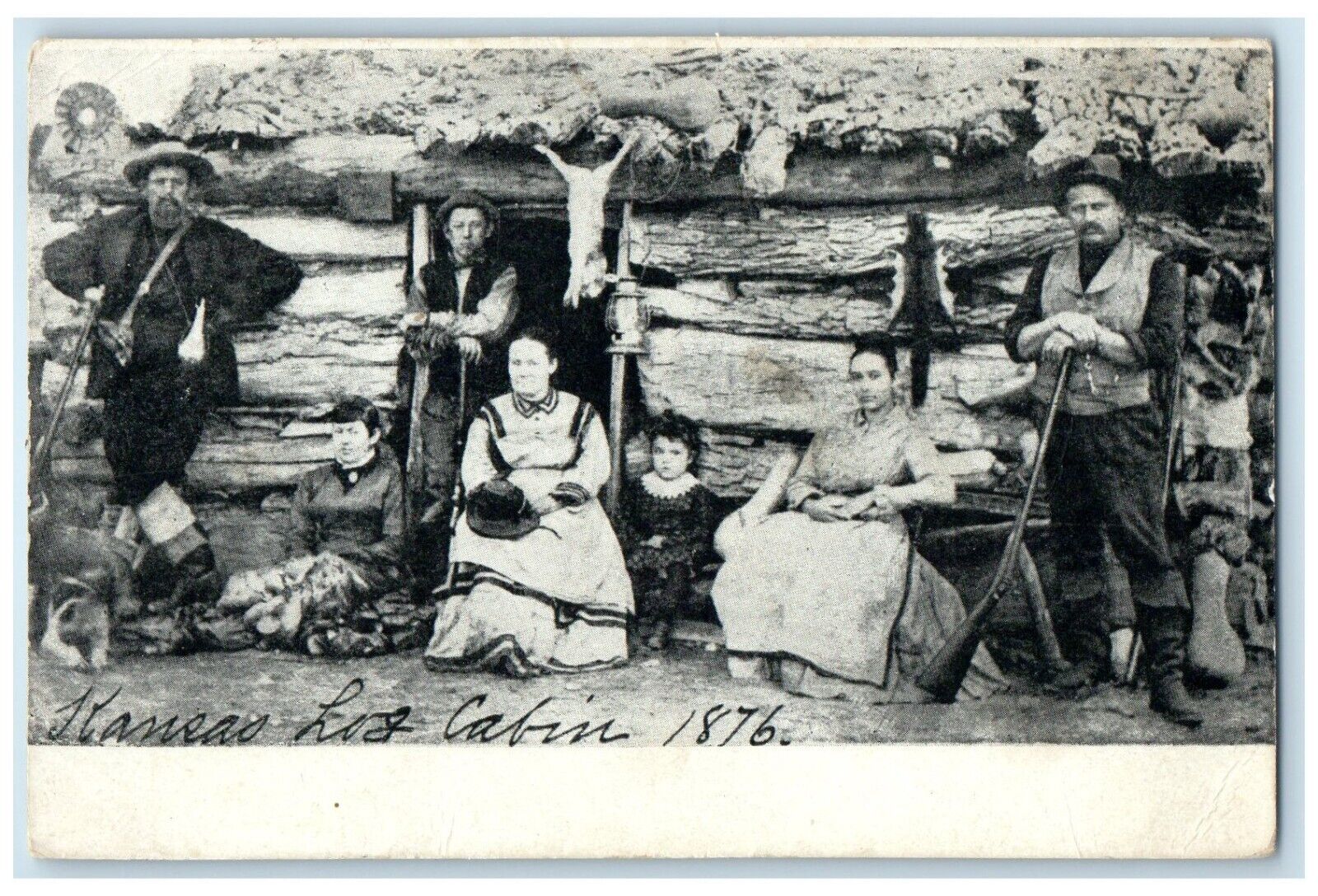 c1910 Exterior Kansas Log Cabin Family Downs Kansas KS Vintage Antique Postcard
