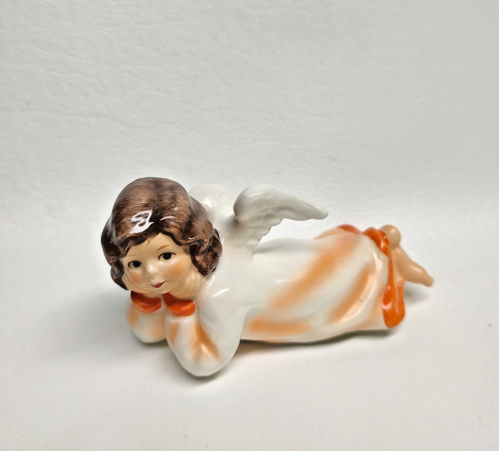 Vintage Goebel Lying Angel Figurine Orange Clothes Unusual West Germany 3-3/4\
