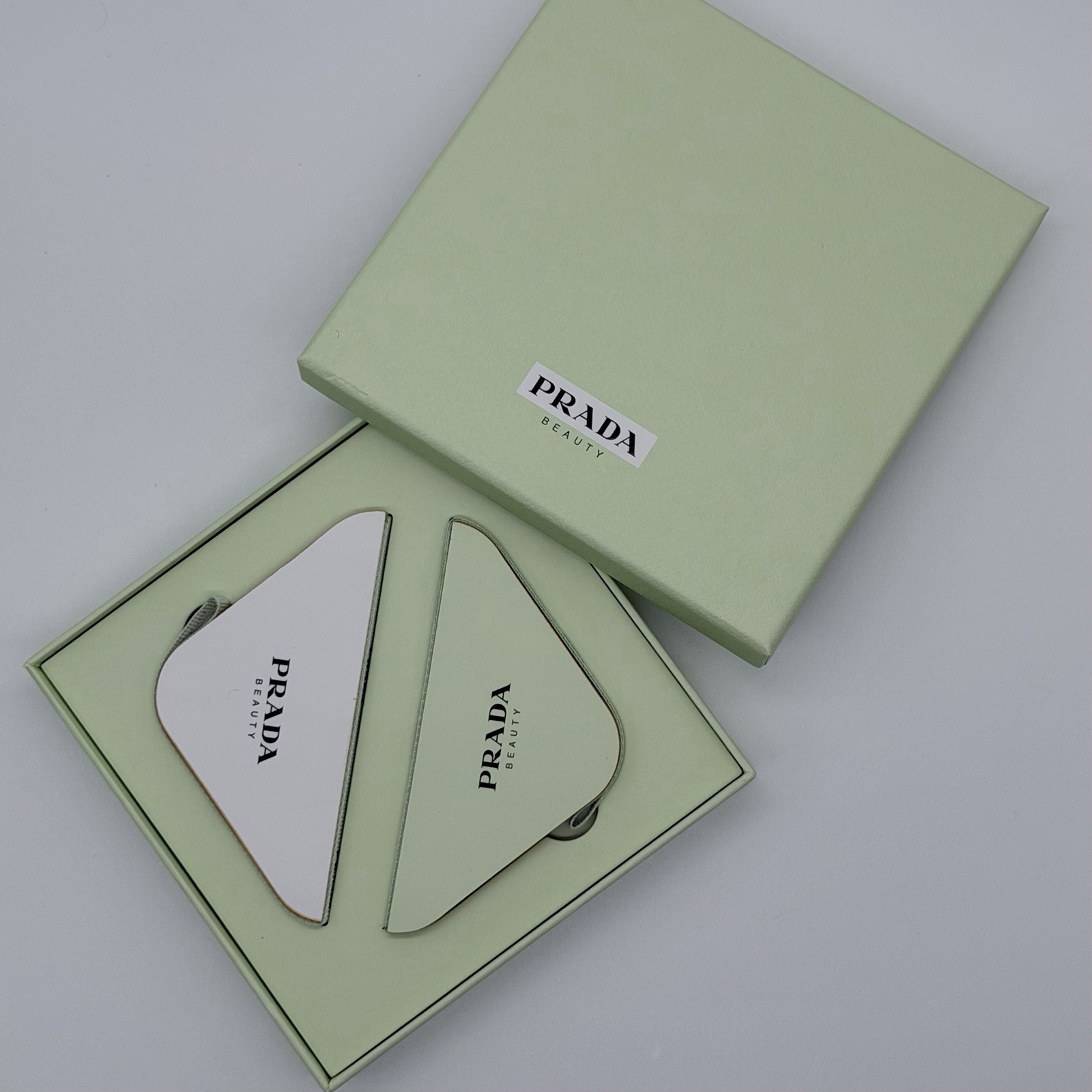 PRADA Beauty Ornaments. Green And White With Gold . Composition Paper See Photo