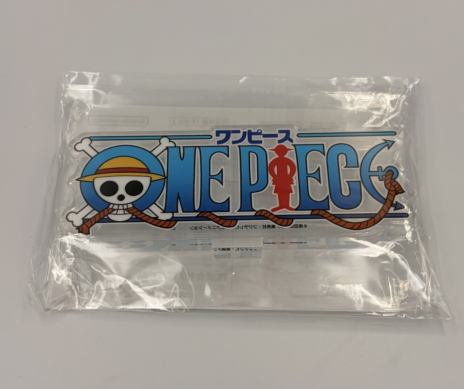 One Piece Logo Clear Acrylic Stand Bandai Namco Official Japan Display