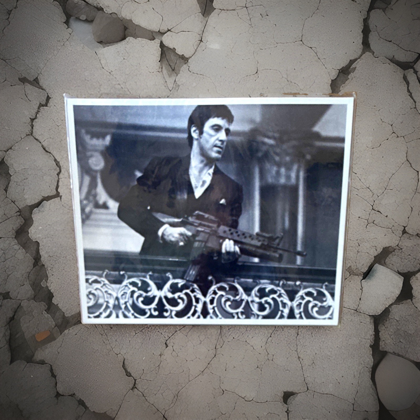 Vintage black-and-white photograph in plastic sleeve Al Pacino scarface 1980s