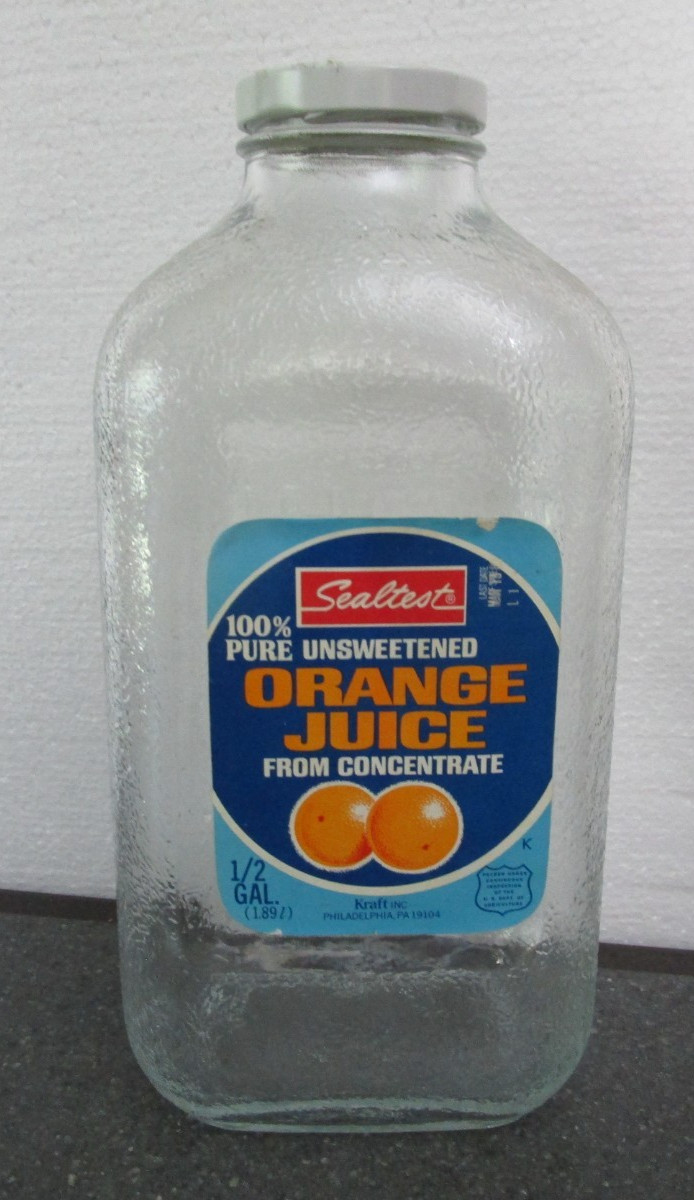 VINTAGE SEALTEST ORANGE JUICE BOTTLE 1/2 GALLON EMPTY  KRAFT INC. PAPER TABLE