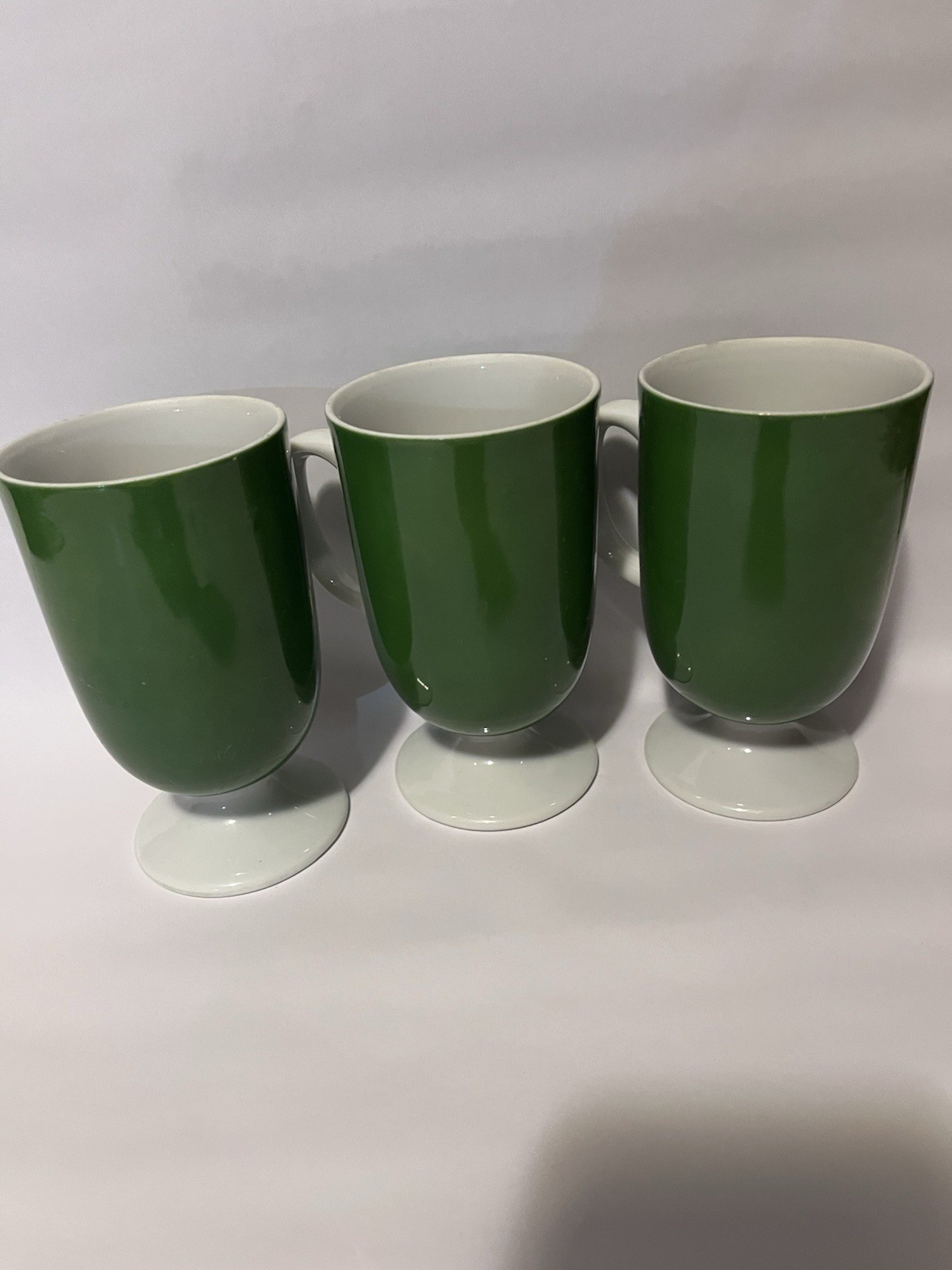 Three Vintage Green Glazed Footed Pedestal Mugs With White Interior