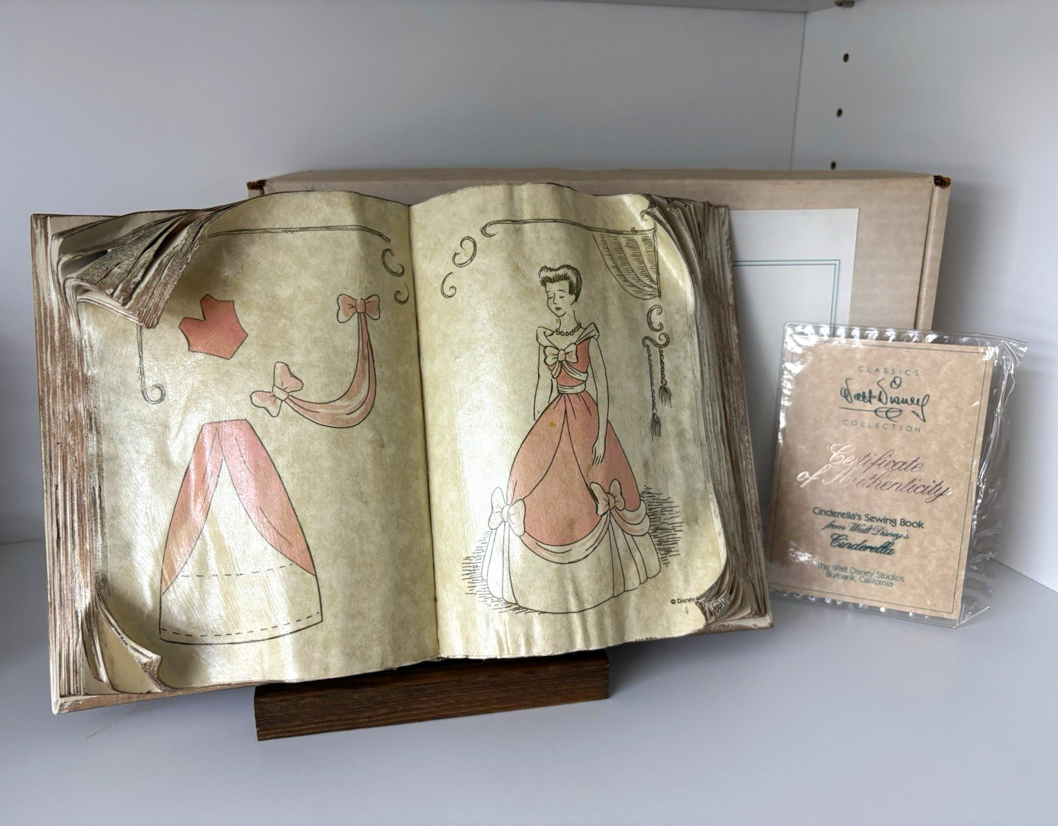 WDCC Cinderella's Sewing Book w/ wood stand and COA