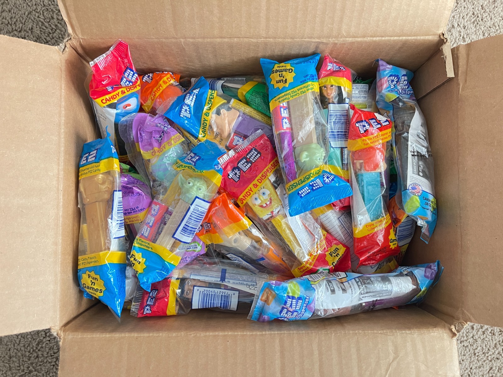 Huge Lot of PEZ Dispensers - Star Wars, Looney Toons, Disney, Sponge Bob, etc