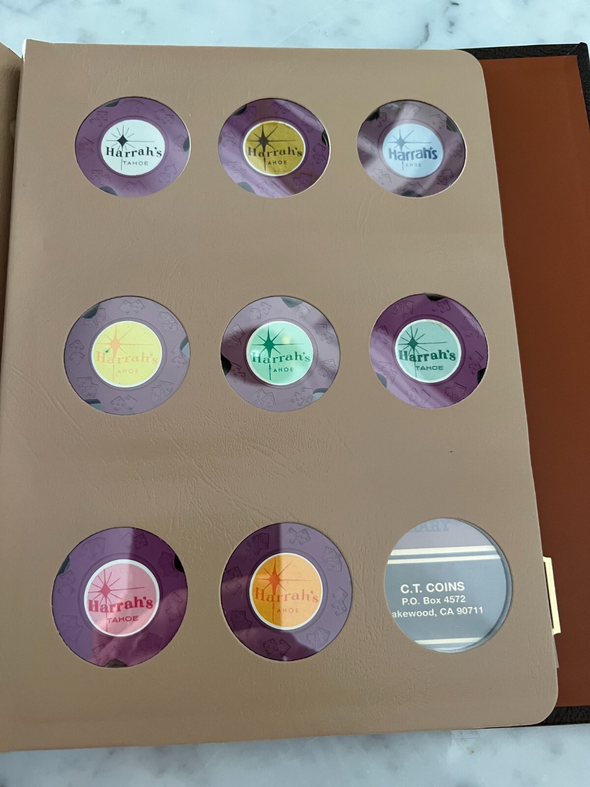 54 Different Harrah\'s Lake Tahoe DieCar Roulette Chips W/ Dansco Binder Included